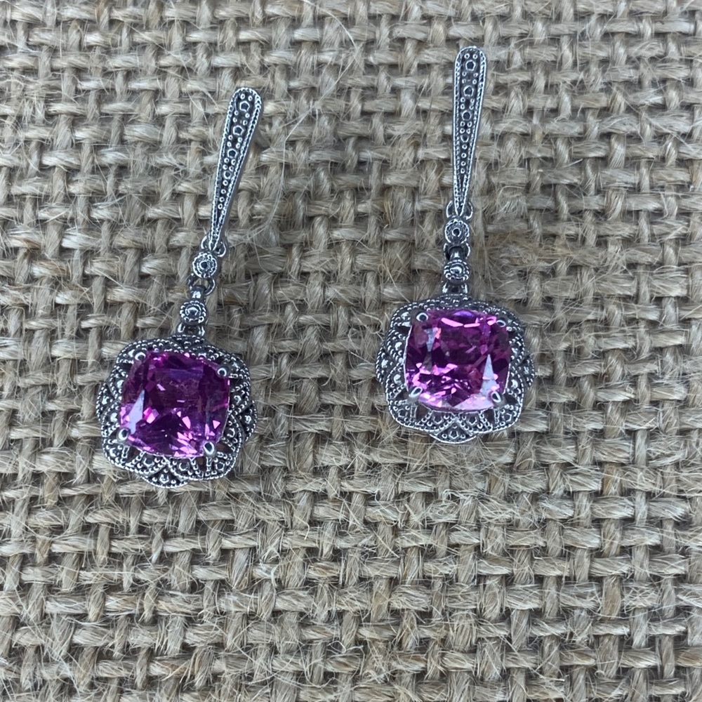 Created pink sapphire dangle earrings.